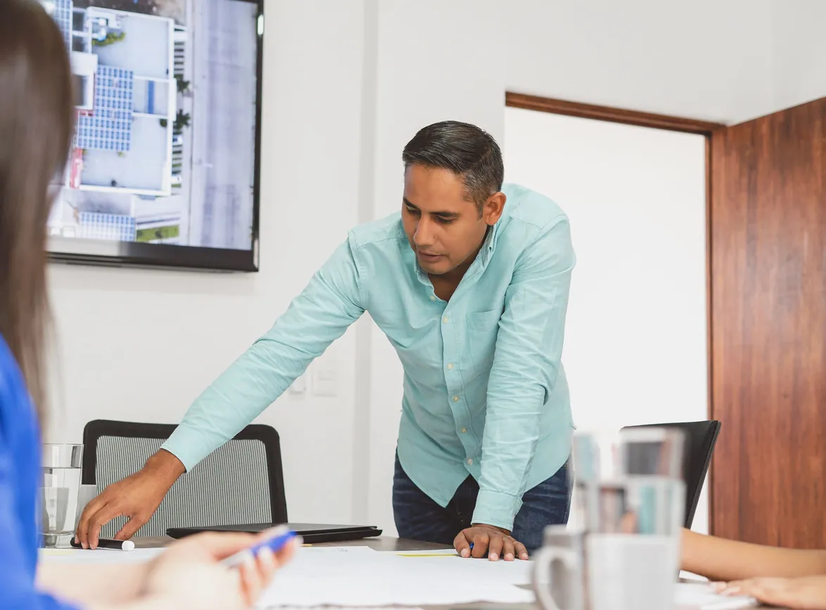 Professional businessman leading a planning session in a modern office